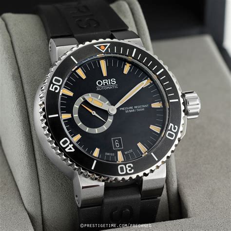 pre owned oris aquis